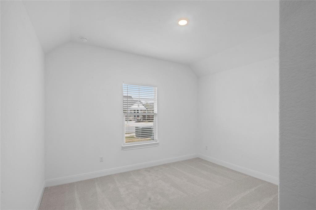 181 Slenderleaf Drive Marble Falls, TX 78654 - Photo 18 of 29 an empty room with windows