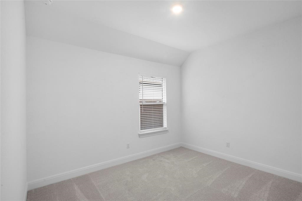 181 Slenderleaf Drive Marble Falls, TX 78654 - Photo 20 of 29 a view of an empty room with a window