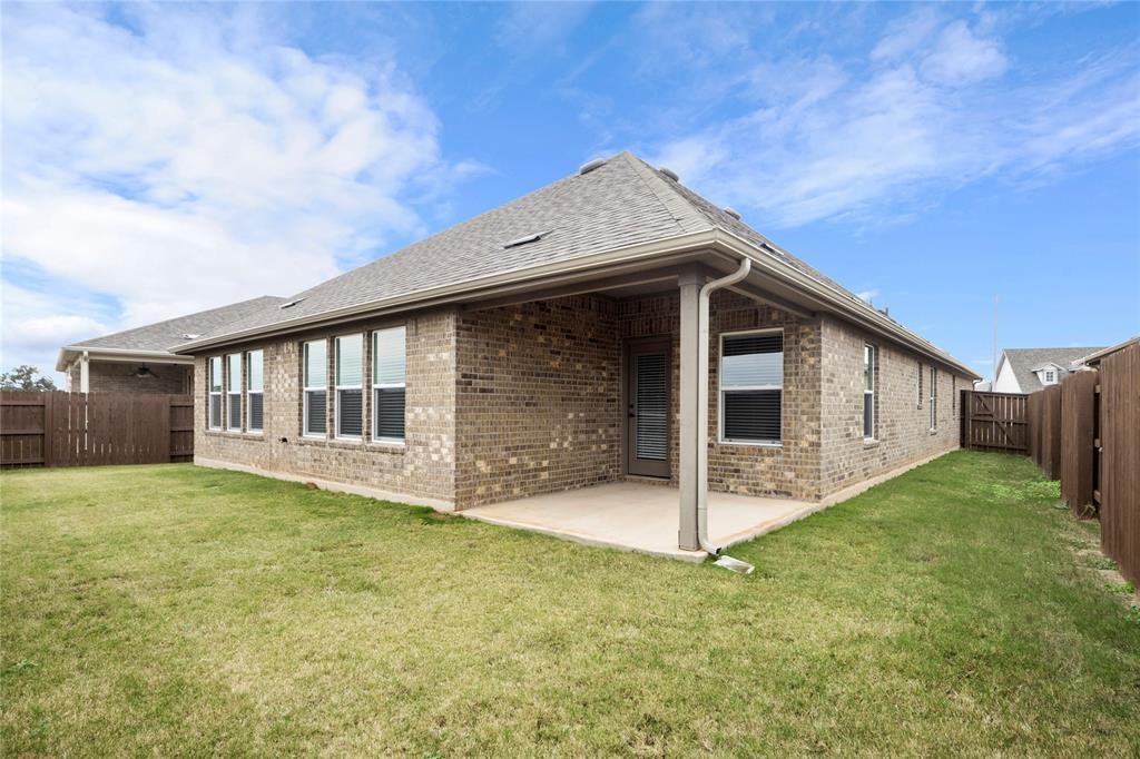 181 Slenderleaf Drive Marble Falls, TX 78654 - Photo 27 of 29 a view of a house with backyard