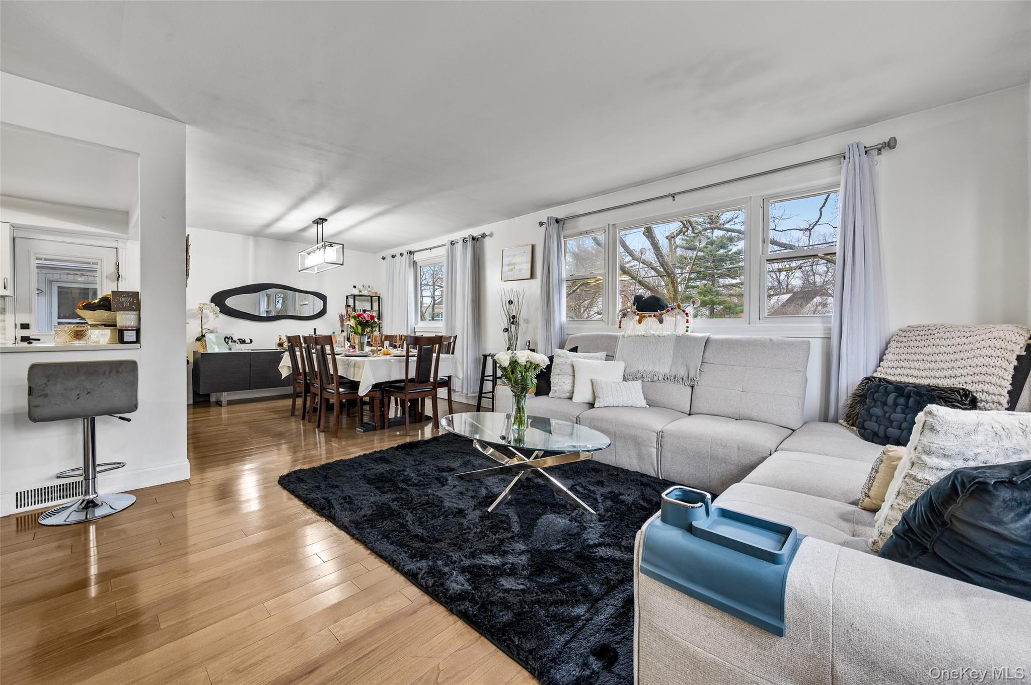 1016 Westwood Road Woodmere, NY 11598 - Photo 3 of 23 Living area featuring wood-type flooring