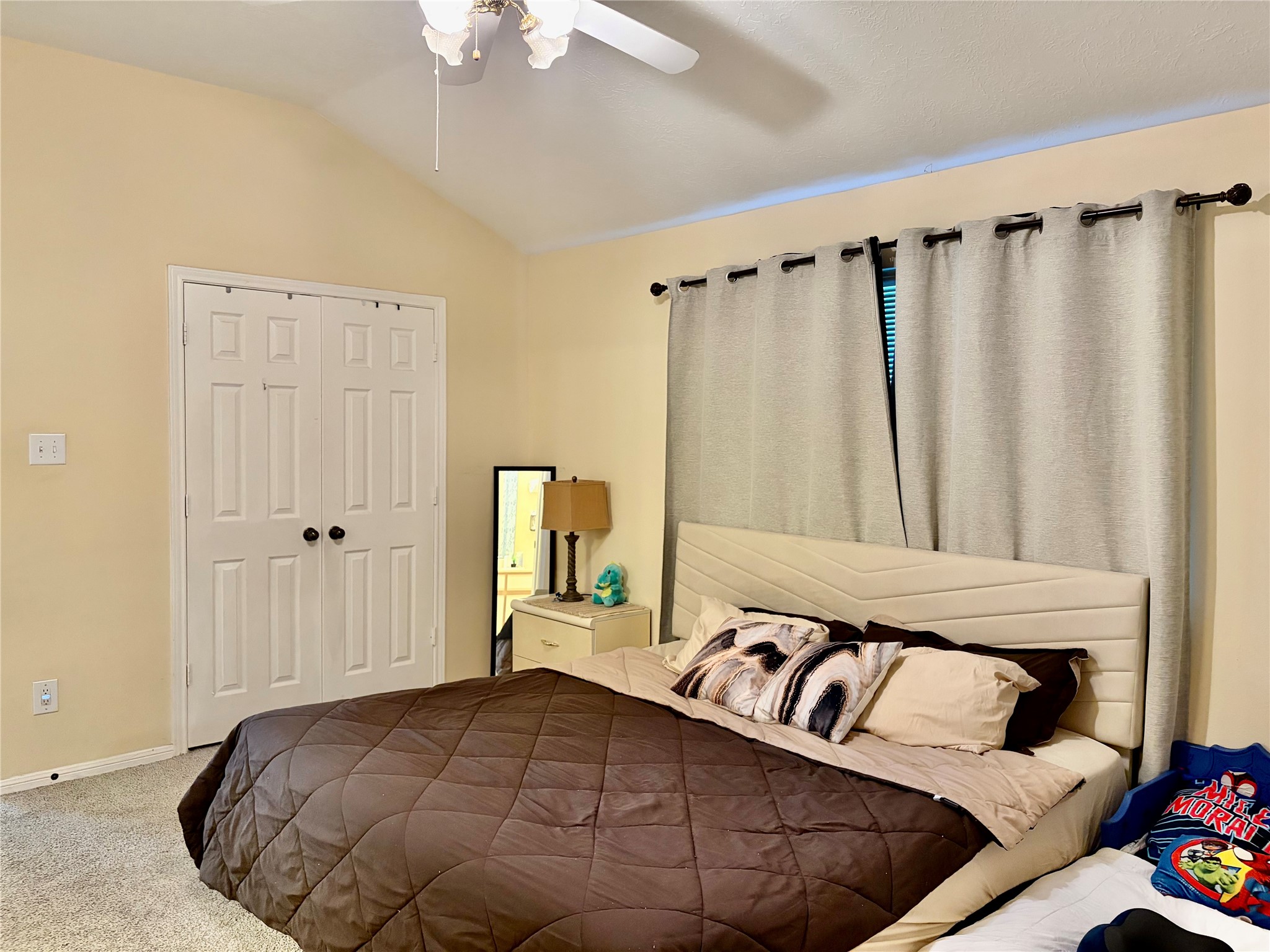 5329 Tallowpine Terrace Katy, TX 77493 - Photo 11 of 21 a bedroom with a large bed and a window