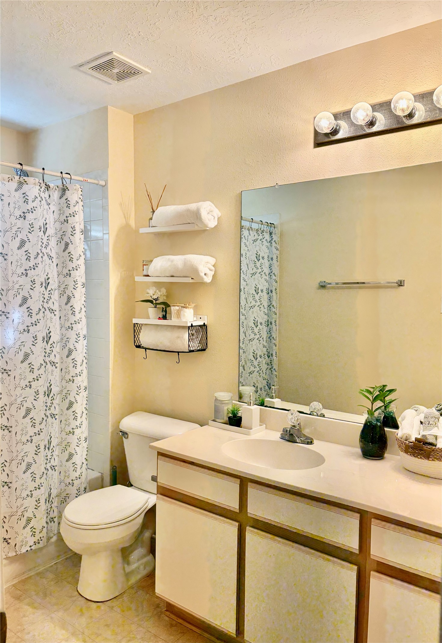 5329 Tallowpine Terrace Katy, TX 77493 - Photo 13 of 21 a bathroom with a sink a toilet and shower curtain