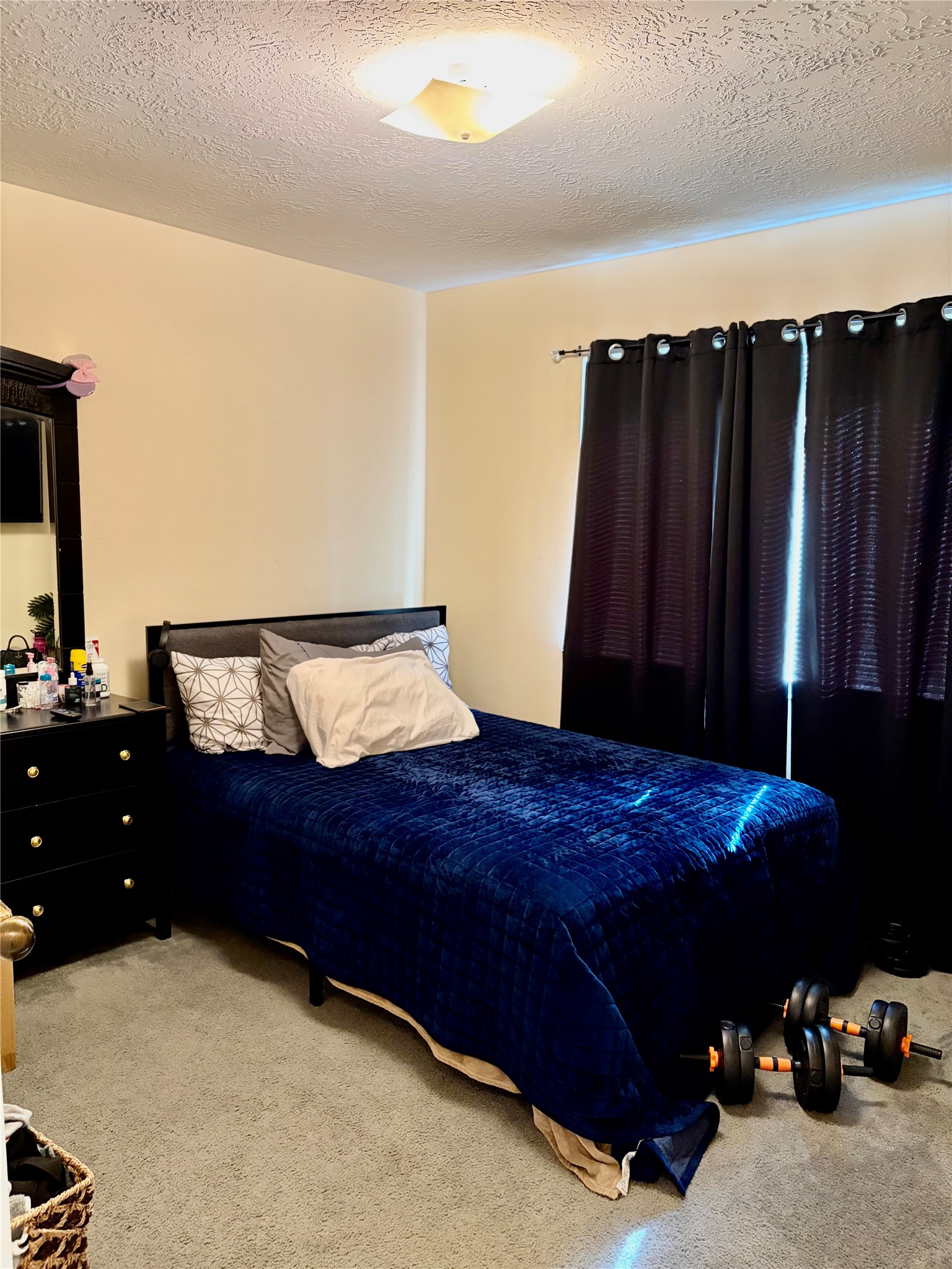 5329 Tallowpine Terrace Katy, TX 77493 - Photo 16 of 21 a bedroom with a bed and a night stand