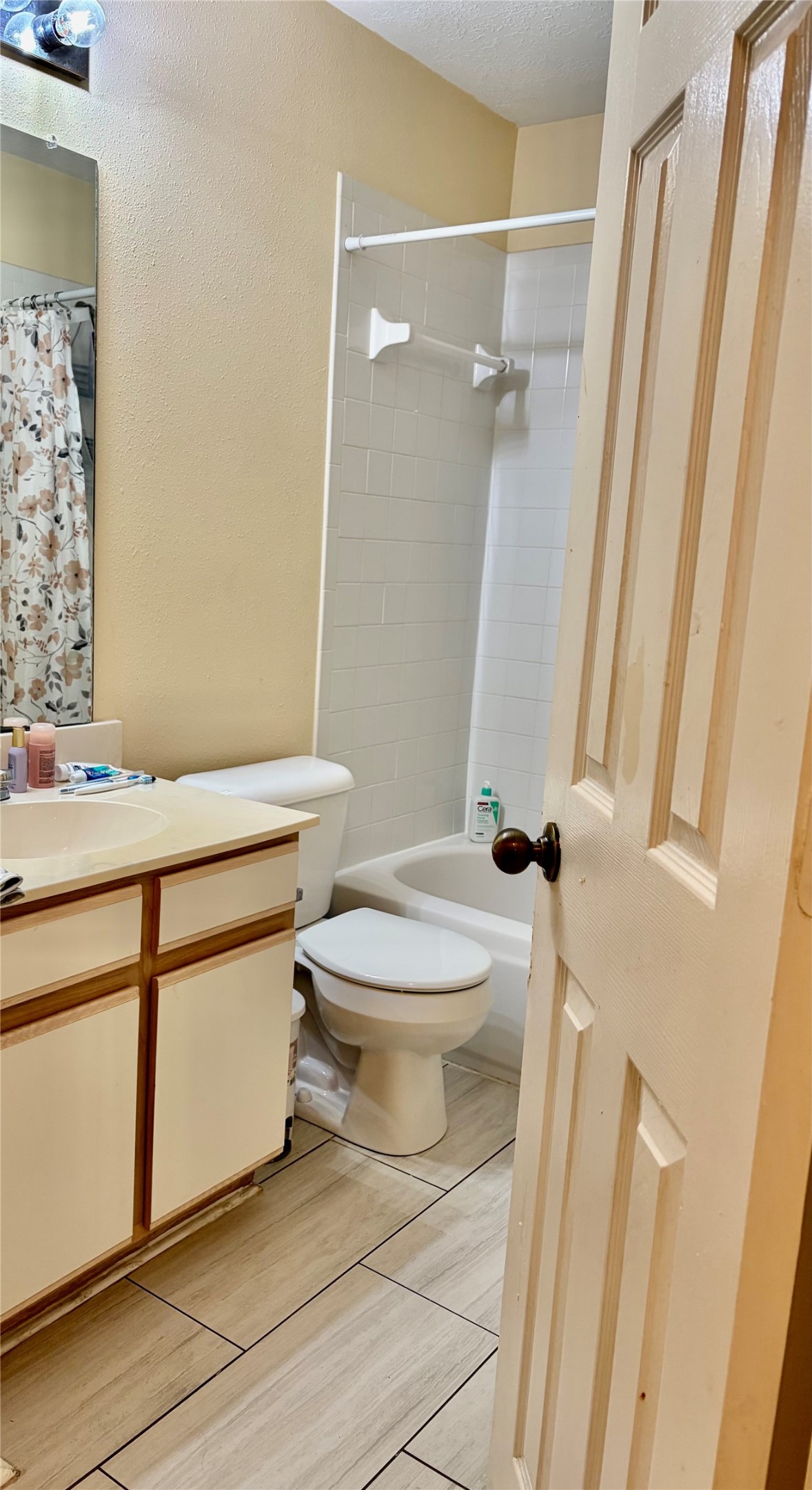 5329 Tallowpine Terrace Katy, TX 77493 - Photo 17 of 21 a white toilet sitting next to a bathroom sink