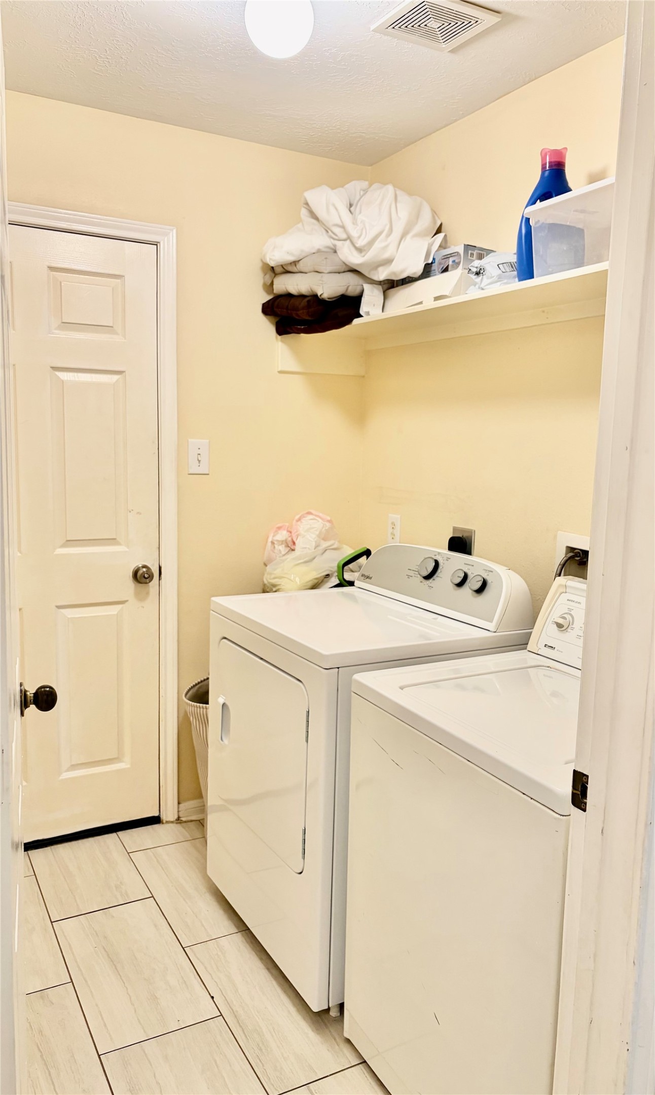 5329 Tallowpine Terrace Katy, TX 77493 - Photo 18 of 21 a utility room with dryer and washer