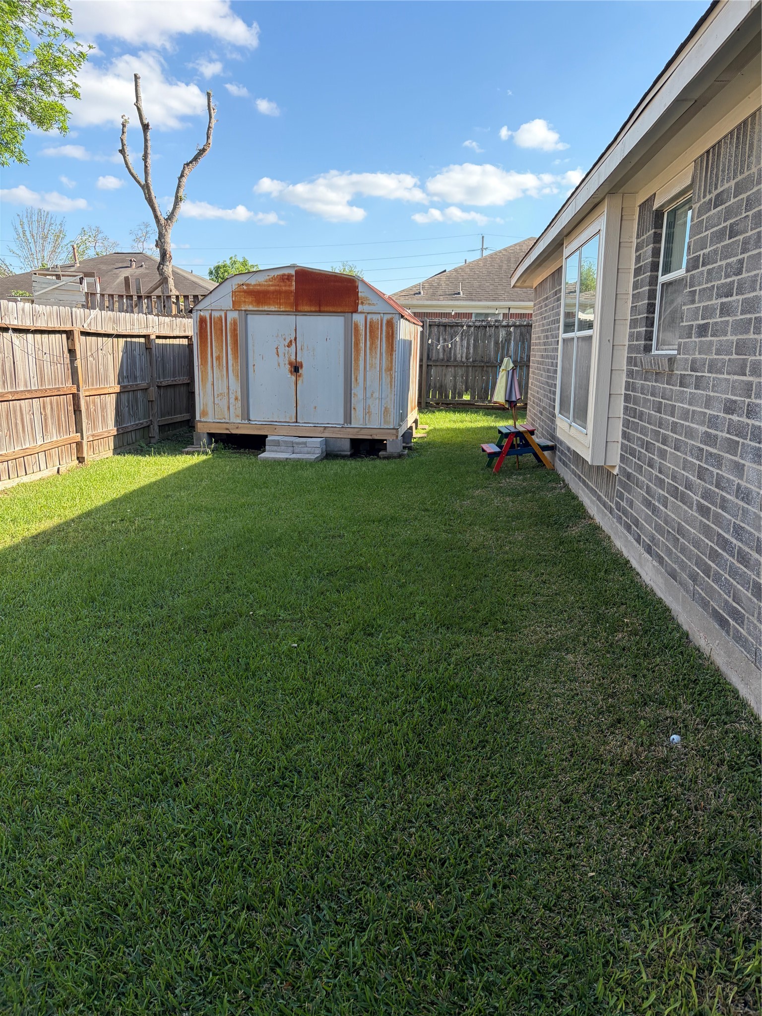 5329 Tallowpine Terrace Katy, TX 77493 - Photo 21 of 21 a view of a house with backyard and garden