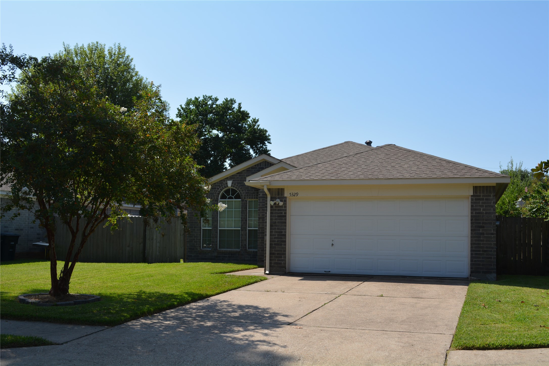 5329 Tallowpine Terrace Katy, TX 77493 - Photo 3 of 21 a front view of a house with garden