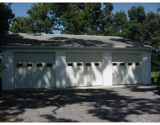 676 Callery Road Evans City, PA 16033 - Photo 12 of 18 Land. 3 car detached garage with electric and water.
