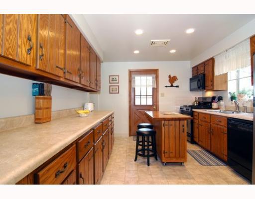 676 Callery Road Evans City, PA 16033 - Photo 4 of 18 Kitchen. Kitchen with abundant cabinet space and removable island.