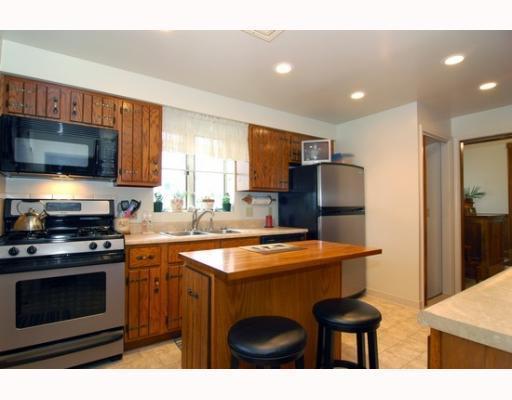 676 Callery Road Evans City, PA 16033 - Photo 5 of 18 Kitchen. Stainless steel appliances in the kitchen.