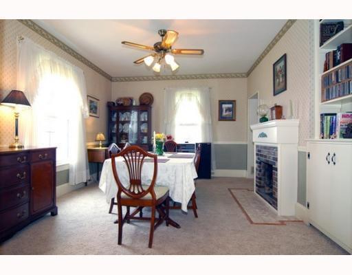 676 Callery Road Evans City, PA 16033 - Photo 6 of 18 Dining Room. Formal dining room with gas fireplace and built in shelves.