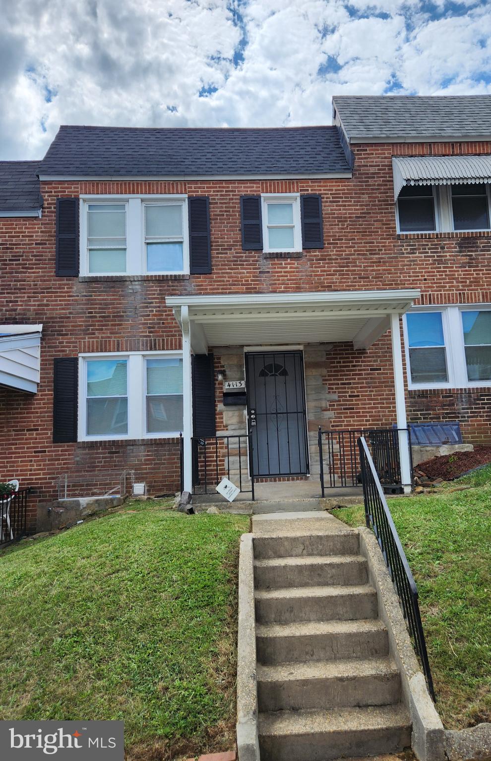 4113 Century Road Baltimore, MD 21206 - Photo 1 of 27 a front view of a house with a yard