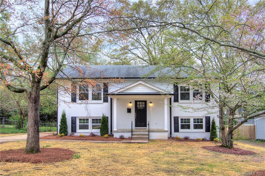 3908 Farmview Road Charlotte, NC 28205 - Photo 2 of 25 a front view of a house with a large tree