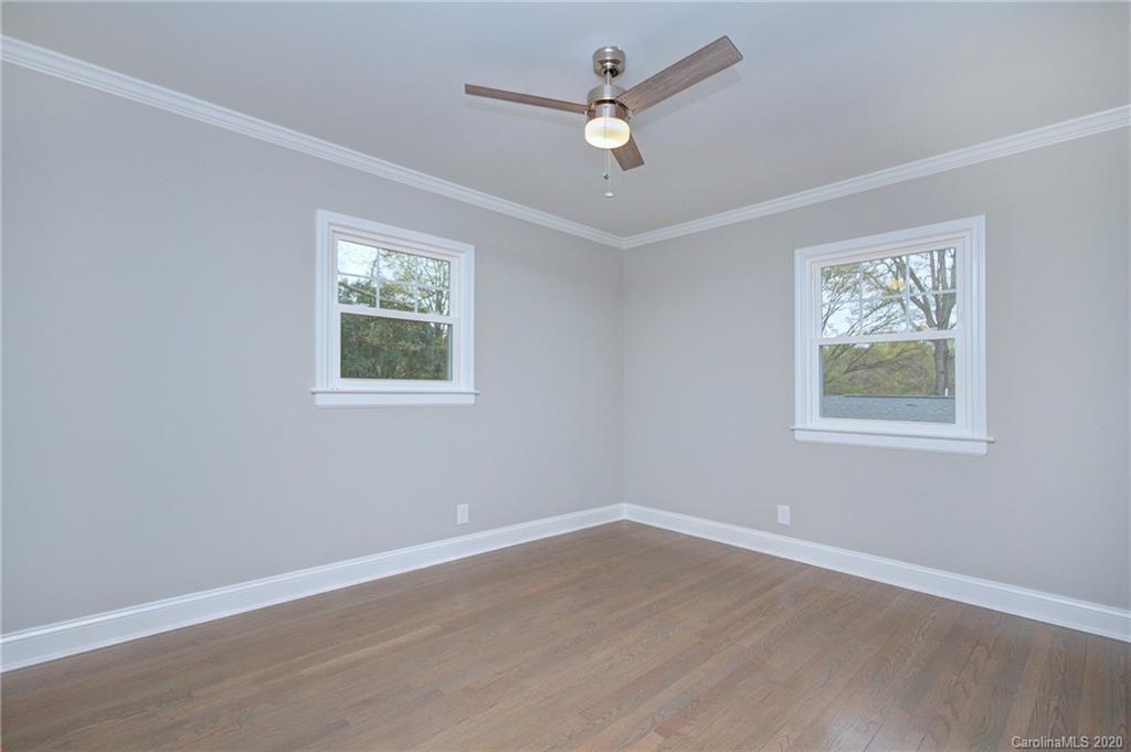 3908 Farmview Road Charlotte, NC 28205 - Photo 17 of 25 a view of an empty room with a window