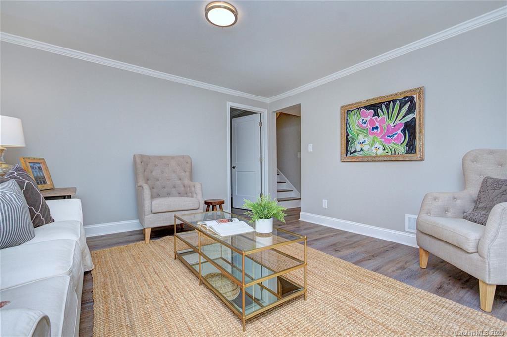 3908 Farmview Road Charlotte, NC 28205 - Photo 19 of 25 a living room with furniture and wooden floor