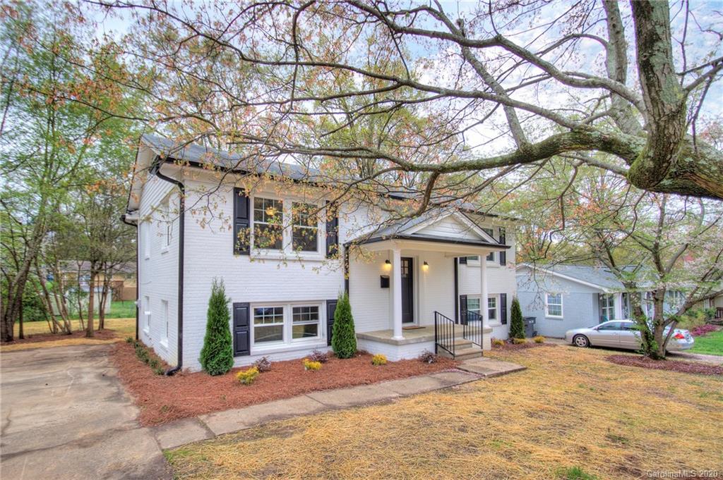 3908 Farmview Road Charlotte, NC 28205 - Photo 3 of 25 a front view of a house with a yard