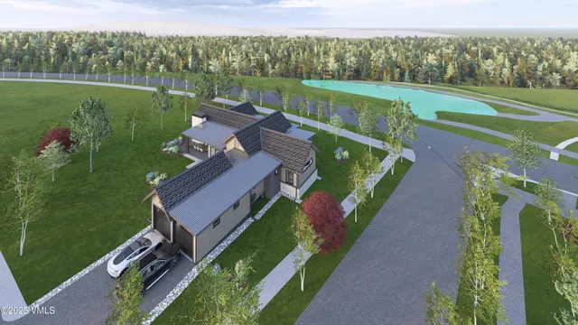 an aerial view of a house with a garden