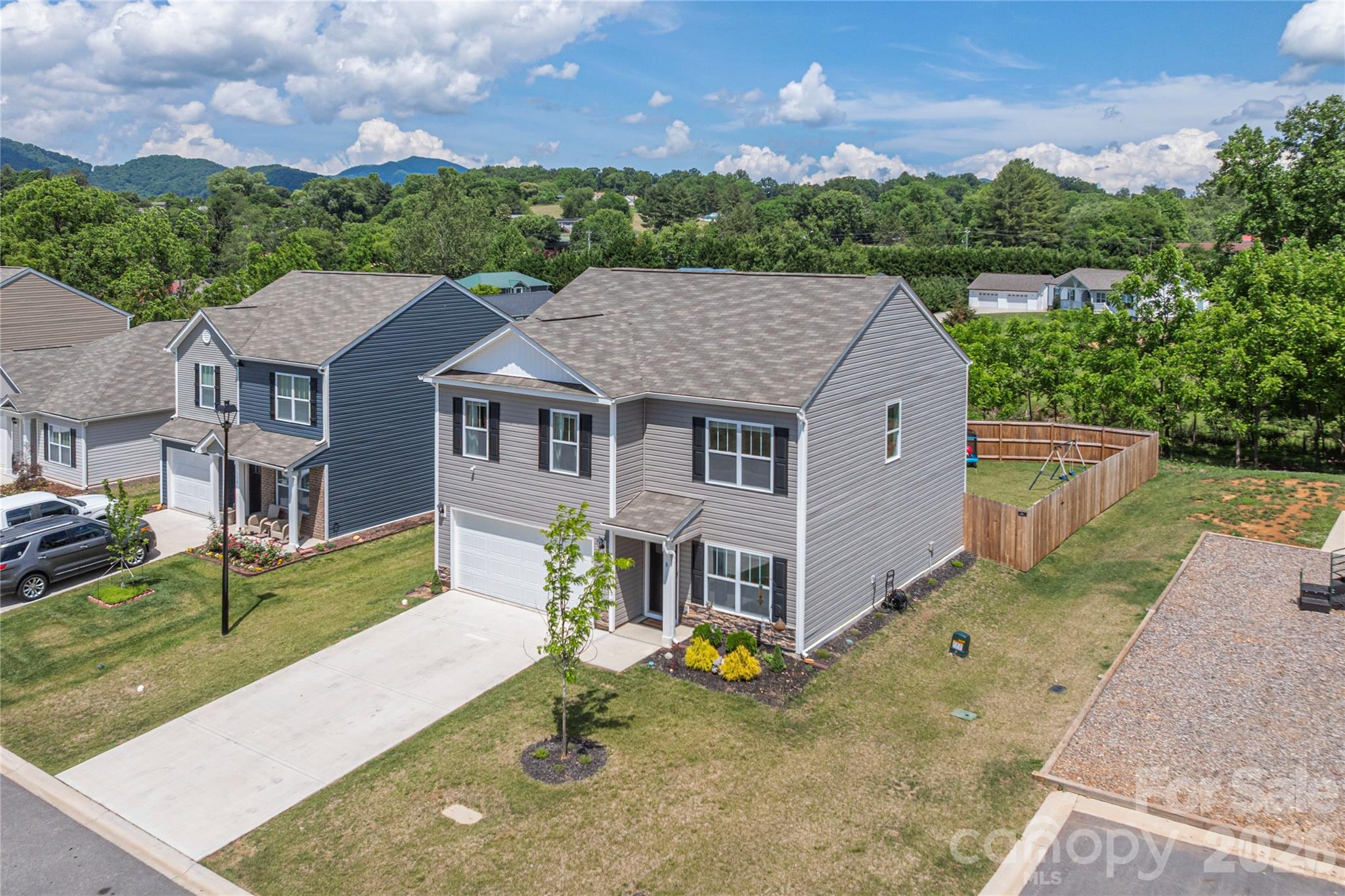 8 Madelyn Drive Clyde, NC 28721 - Photo 42 of 43 an aerial view of a house with swimming pool garden and barbeque oven