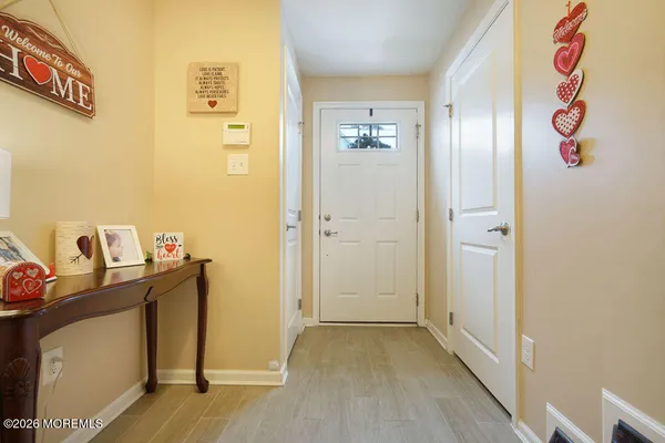 a view of a storage & utility room with a window