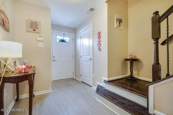 a view of a hallway with workspace