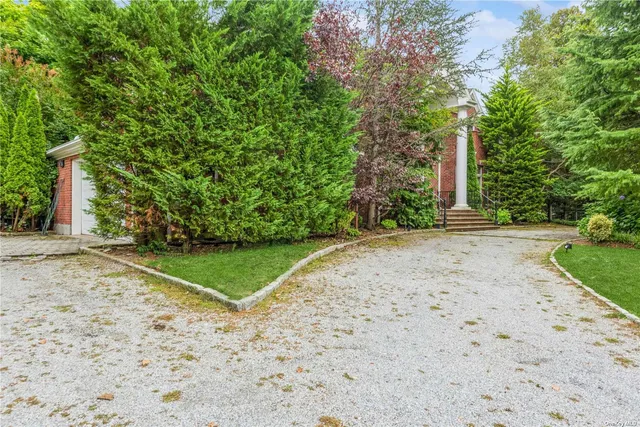 a view of a road with a trees
