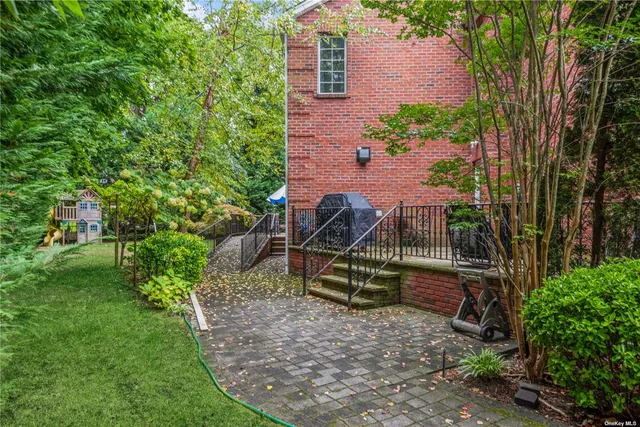 a view of a park with large trees
