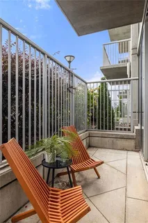 a view of a chairs and tables in the patio