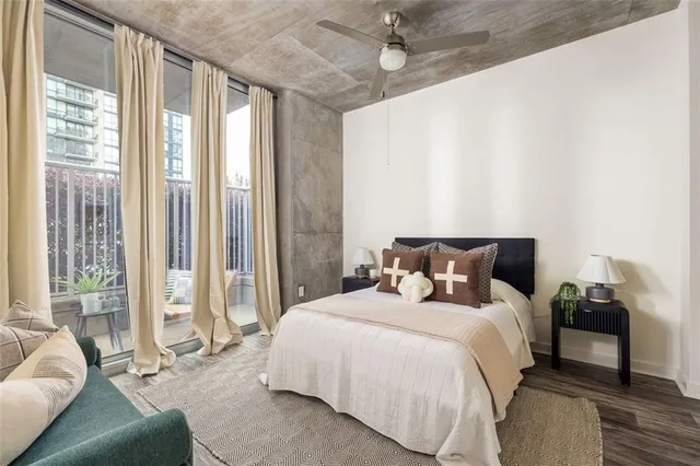 a bed room with a bed and a couch