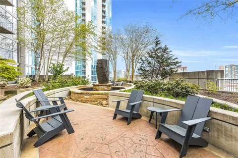 a view of a patio with a yard