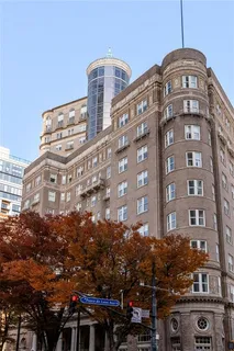 a front view of a building with street view