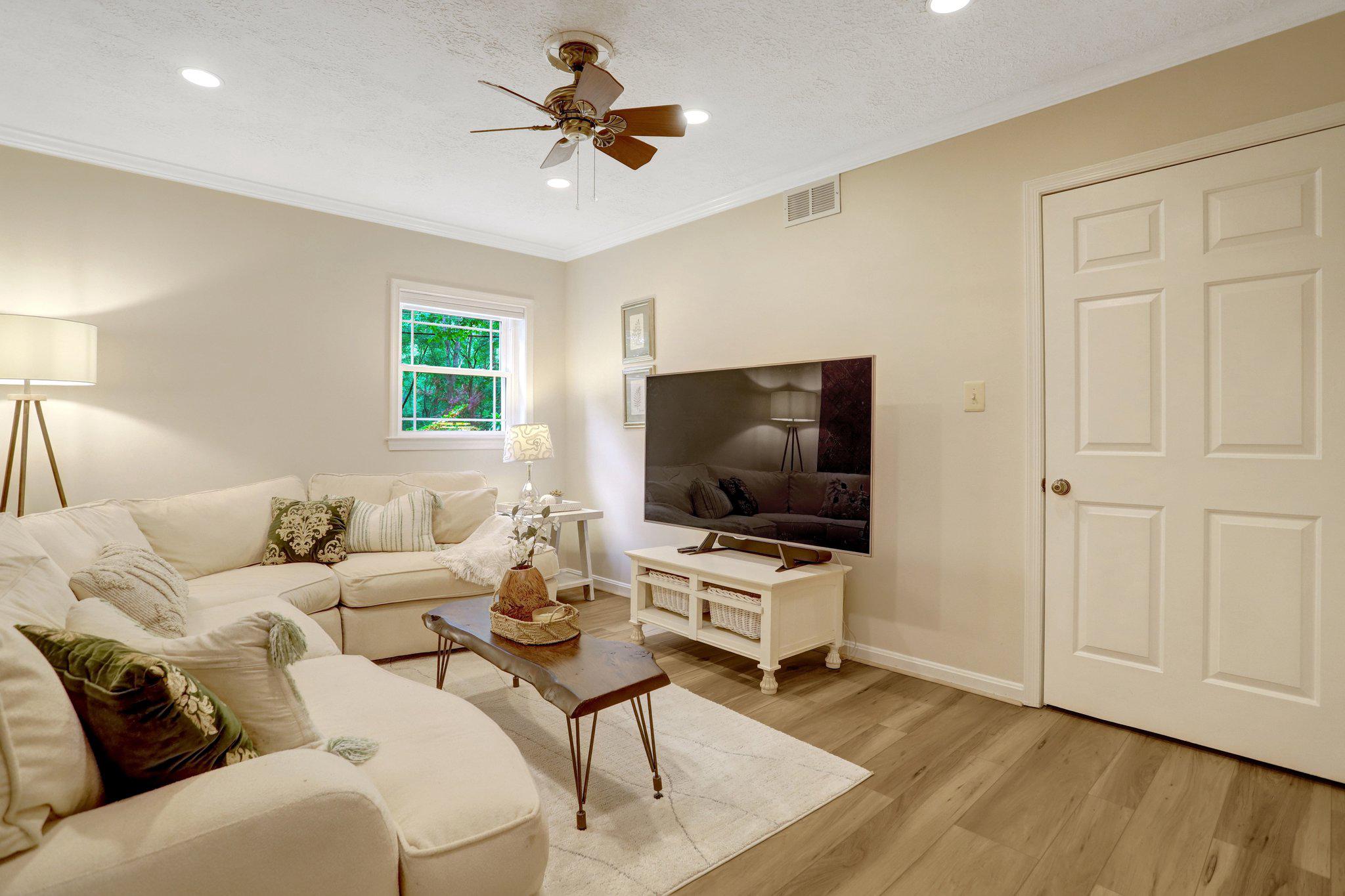7506 Oriole Avenue Springfield, VA 22150 - Photo 39 of 67 a living room with furniture and a flat screen tv
