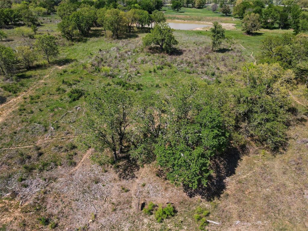Lot 47 Paradise Oaks Ranch Perrin, TX 76487 - Photo 6 of 8 Aerial overview of property's location featuring a nearby body of water and rural landscape