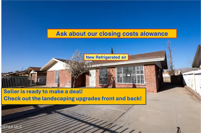 a view of a swimming pool with an outdoor seating