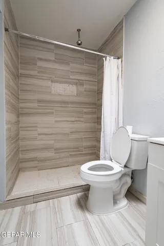 a bathroom with a sink a vanity and a mirror