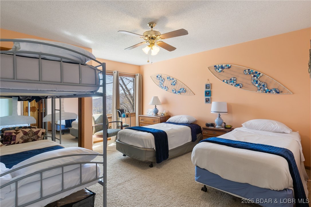 1436 Cherokee Road, Unit 2A Lake Ozark, MO 65049 - Photo 19 of 26 Upstairs bedroom ensuite