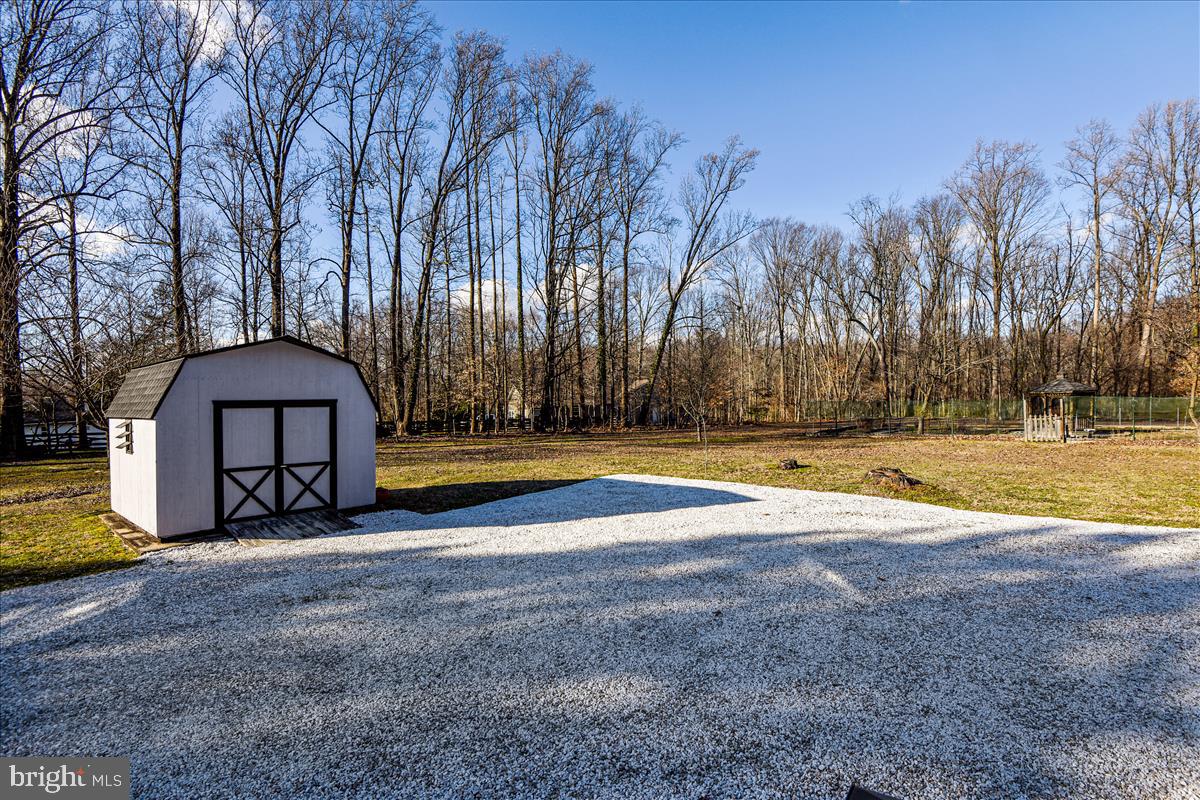 1439 Gilbert Road Arnold, MD 21012 - Photo 43 of 68 Wrap Porch And View With Storage Shed