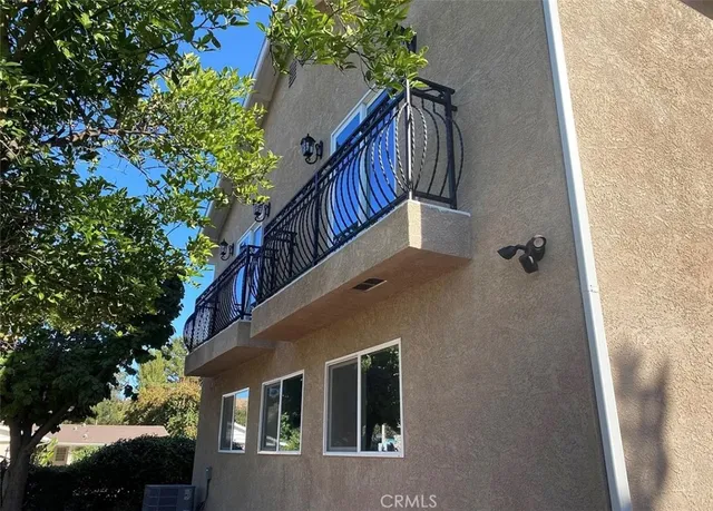 a house view with a outdoor space