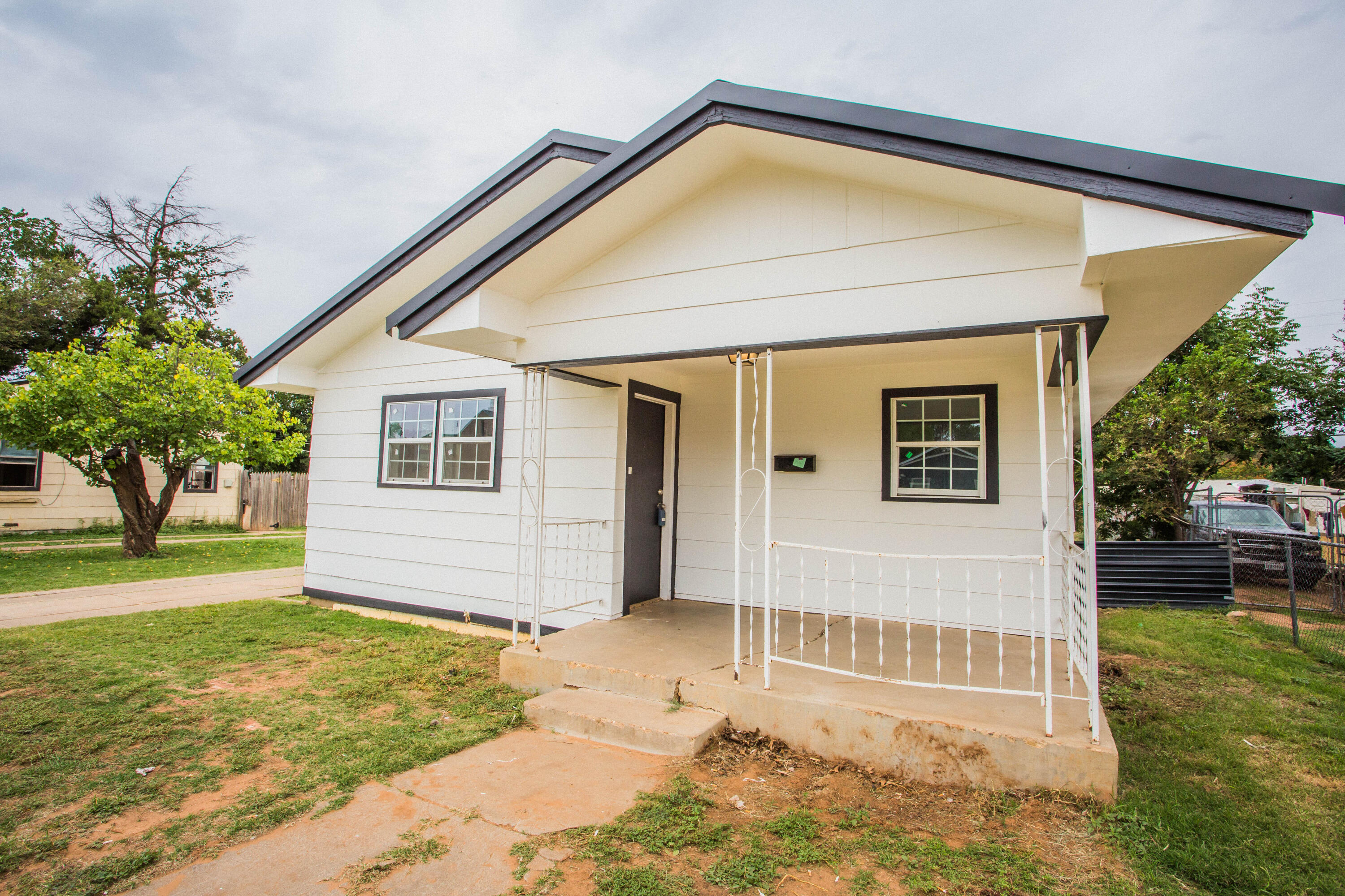 3012 39th Street Lubbock, TX 79413 - Photo 4 of 31 a view of a house with a yard