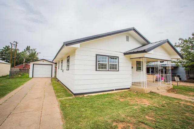 a view of a house with a swimming pool