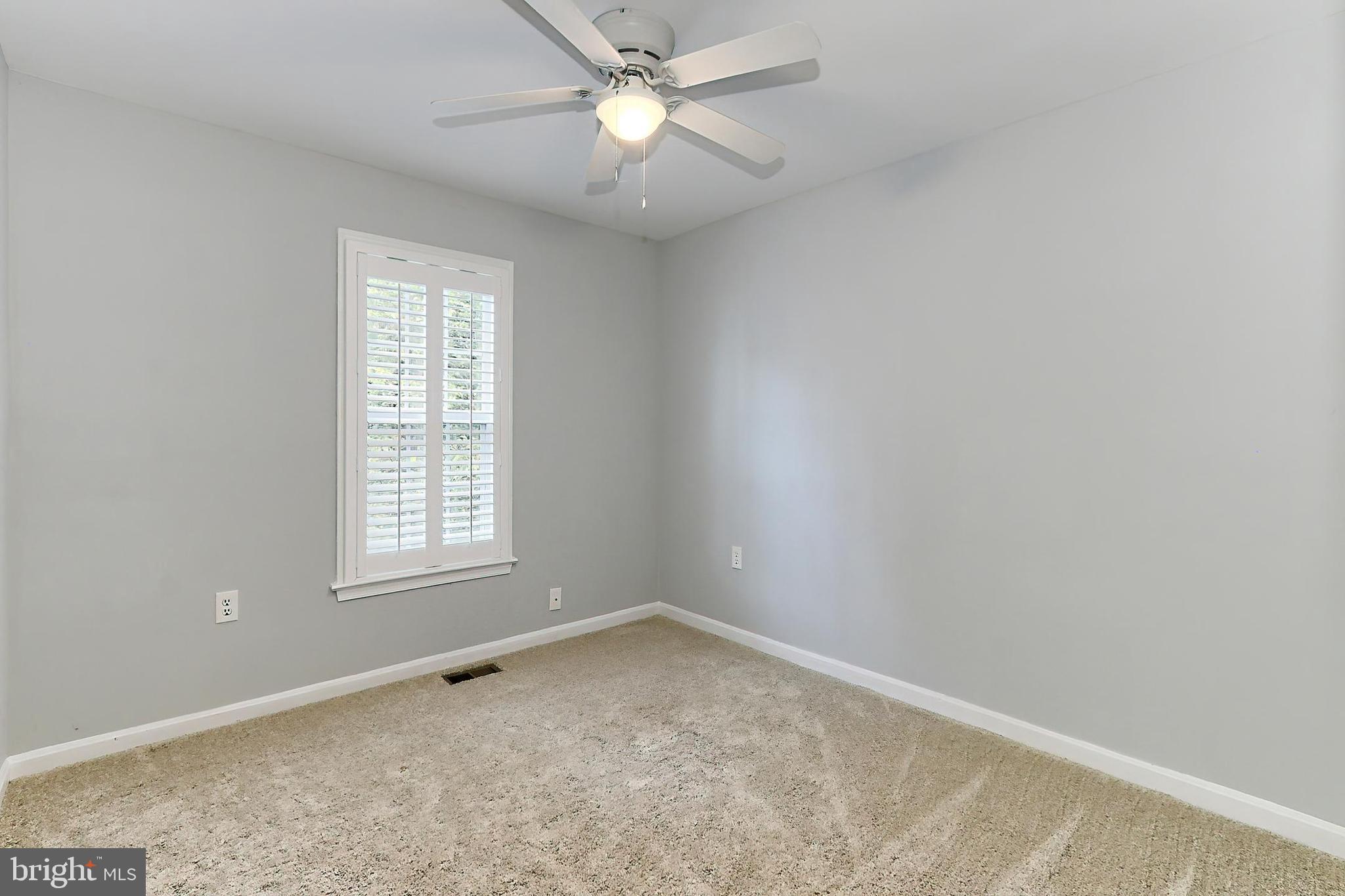 10270 Latney Road Fairfax, VA 22032 - Photo 27 of 52 Bedroom 3 w/neutral carpeting & lighted ceil fan