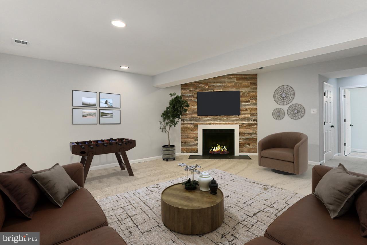 10270 Latney Road Fairfax, VA 22032 - Photo 29 of 52 Lower level family room virtually staged