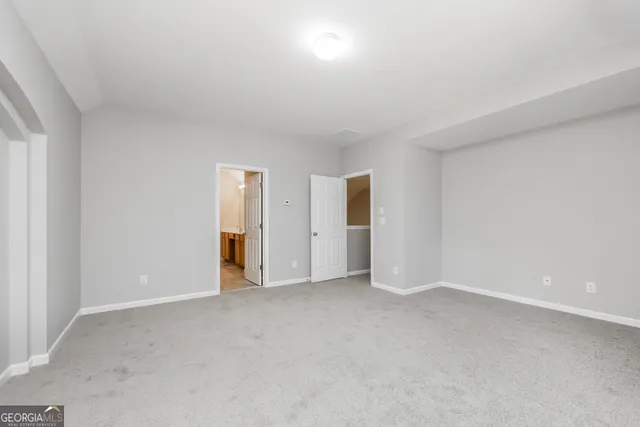 an empty room with an entryway