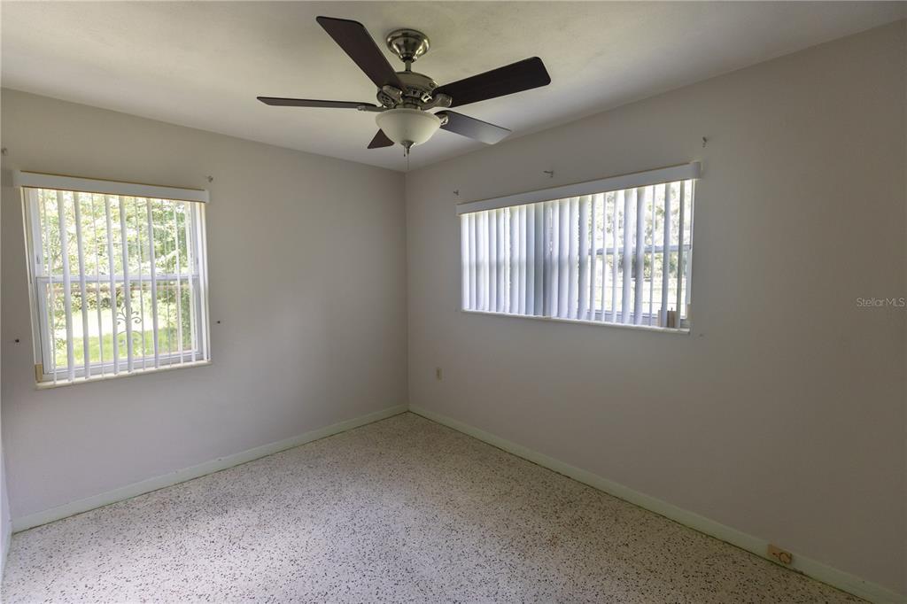 1010 Glen Ridge Drive Leesburg, FL 34748 - Photo 15 of 24 a view of an empty room with a window