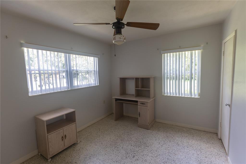 1010 Glen Ridge Drive Leesburg, FL 34748 - Photo 16 of 24 a room with furniture and a window