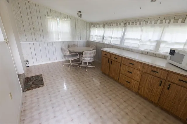 a view of a kitchen with cabinets