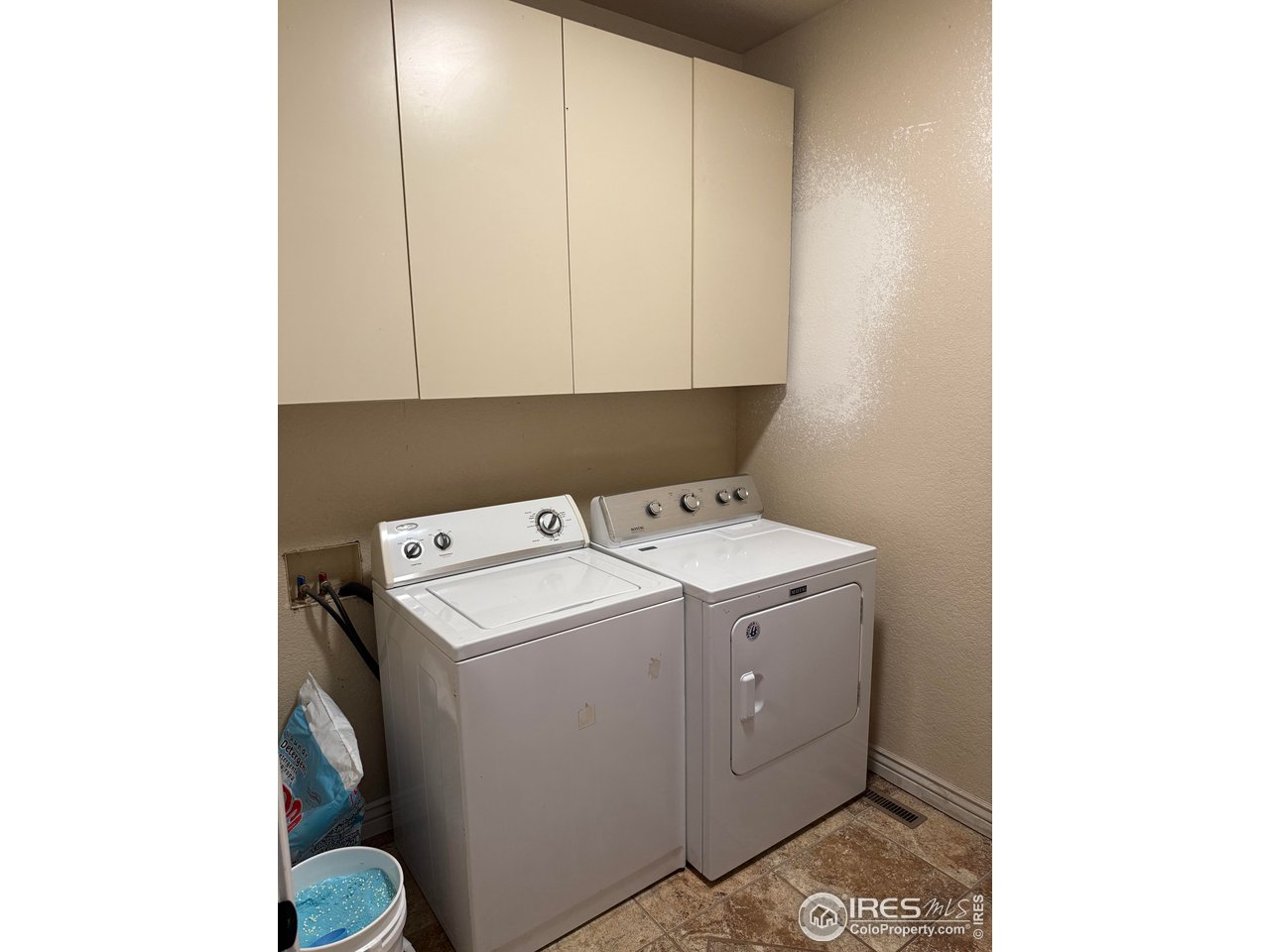 419 East 3rd Avenue Wiggins, CO 80654 - Photo 19 of 20 a utility room with dryer and washer