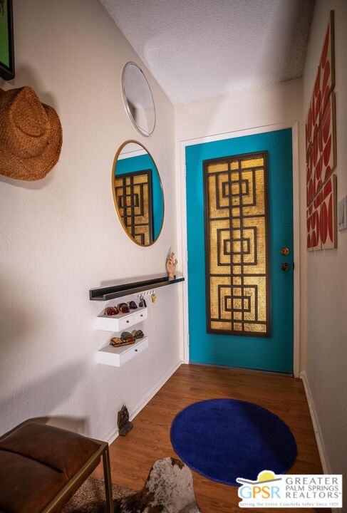 1050 Ramon Road, Unit 34 Palm Springs, CA 92264 - Photo 6 of 10 a view of a room that has a bed and a window