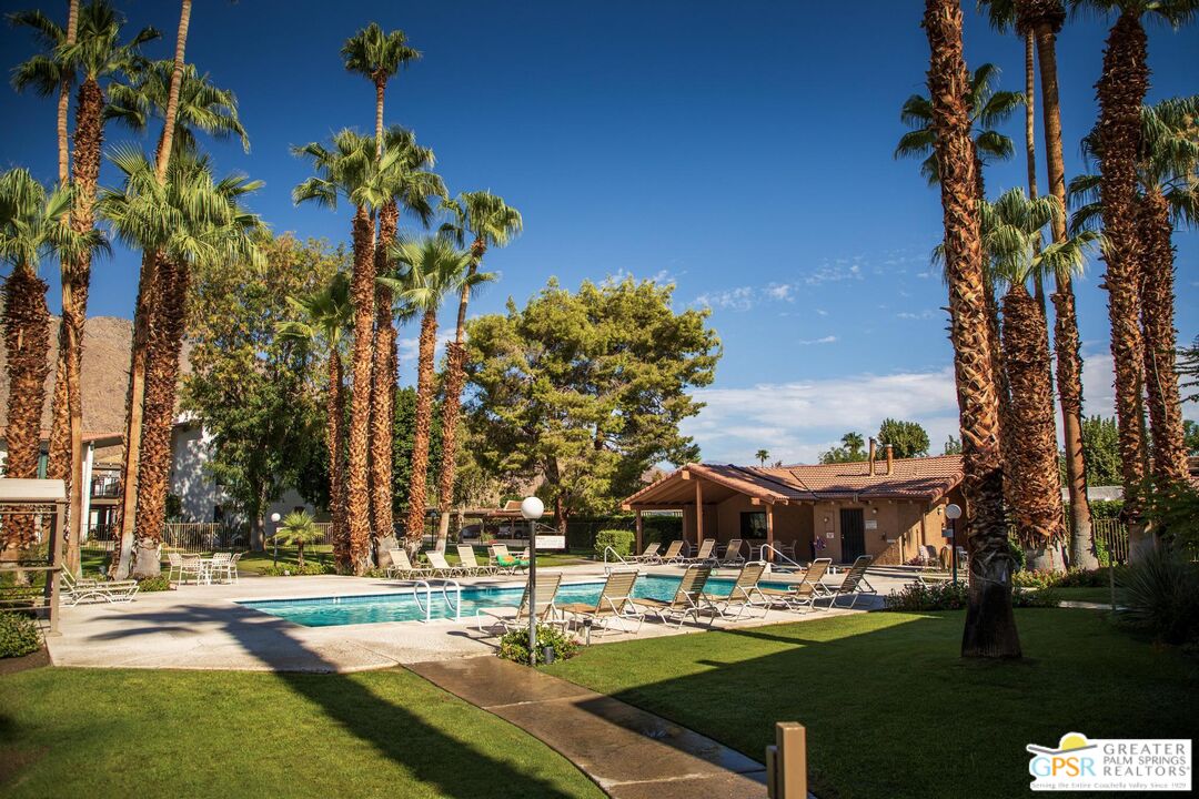 1050 Ramon Road, Unit 34 Palm Springs, CA 92264 - Photo 9 of 10 a view of a house with a yard