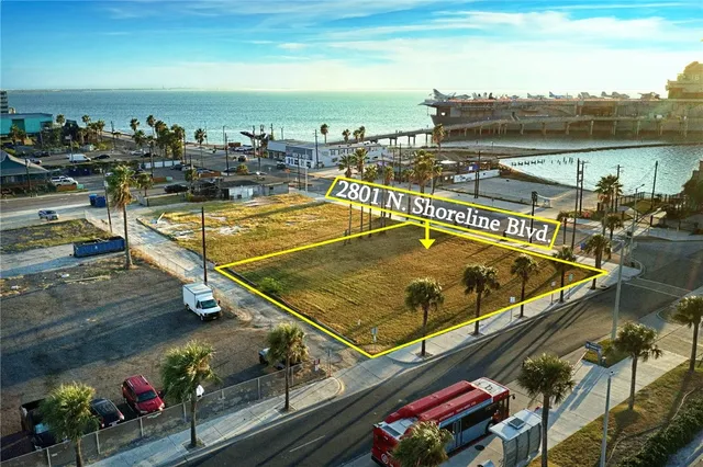 a view of a balcony with an ocean view