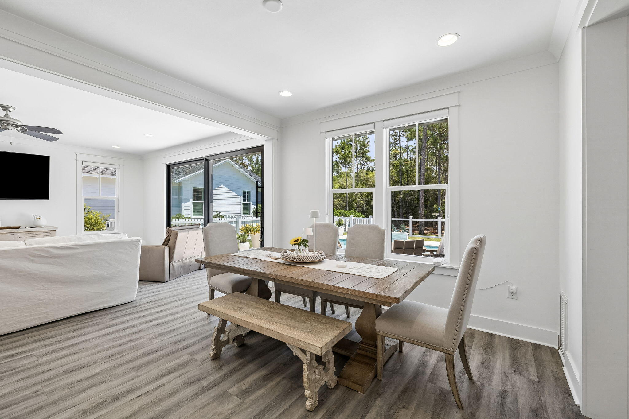 115 Log Landing St Inlet Beach Inlet Beach, FL 32461 - Photo 16 of 69 a view of a dining room with furniture wooden floor and a rug
